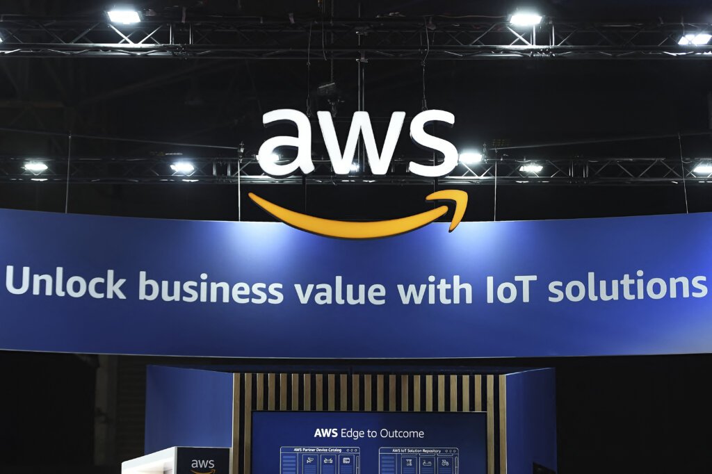 Both Maxis and CelcomDigi plan to develop and implement the official language of Malaysia, Bahasa Melayu language algorithms with AWS. (Photo by Pau BARRENA/AFP).